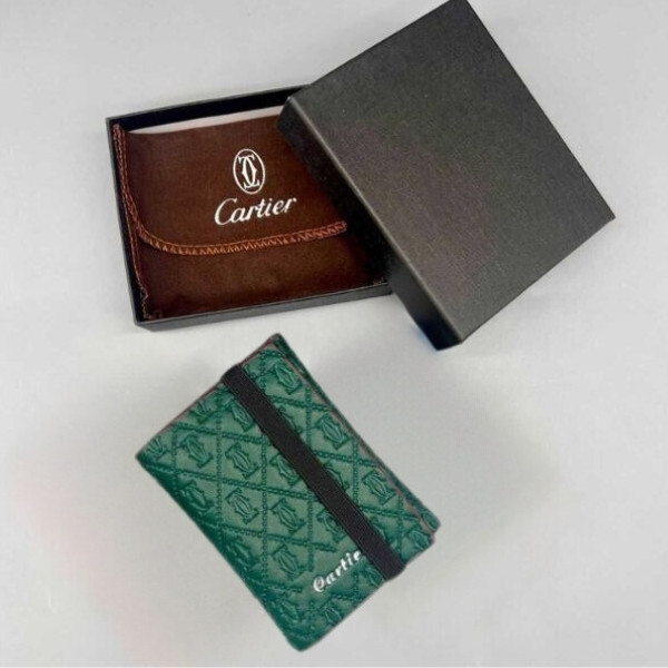 A Cartier Wallet Made of Grained High-Quality Leather / Available in Bright Green